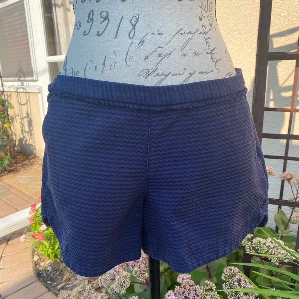 Lilly Pulitzer True Navy Blue Adie textured shorts with fringe detail.
